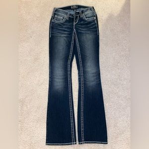 Woman’s Silver Jeans.